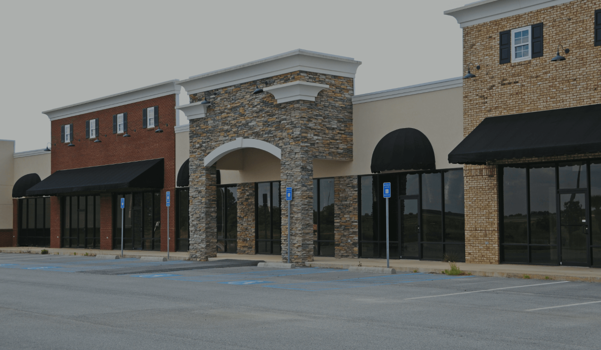 Commercial warehouse property with flat roofing system