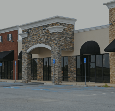 Commercial warehouse property with flat roofing system