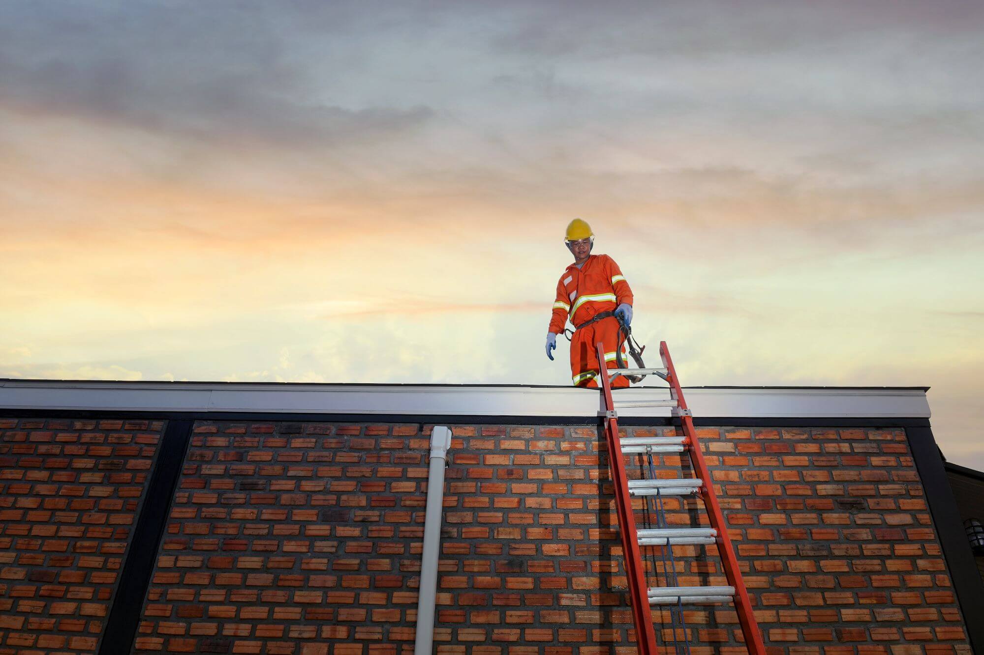 Commercial roofing project on a large Morrison building showing membrane work and rooftop equipment