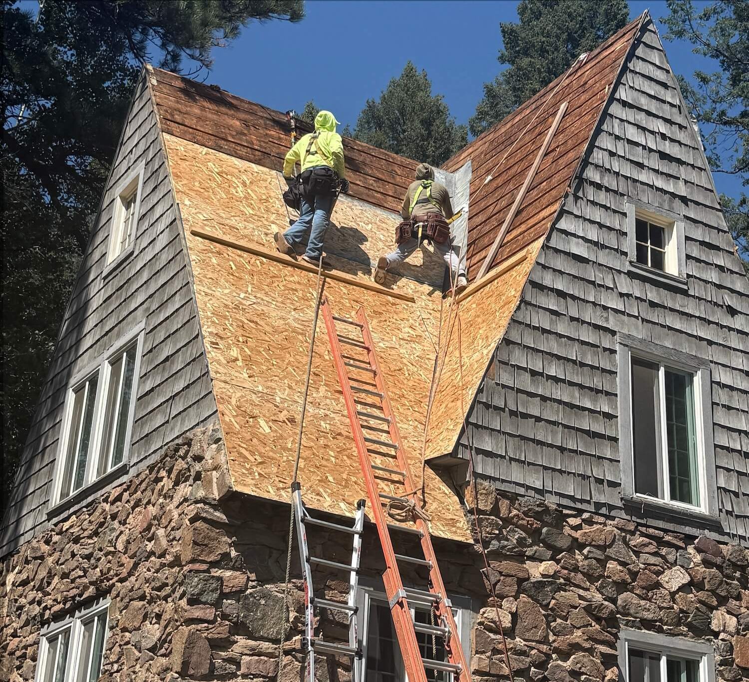 Premier Restoration & Construction installing a new roof on Morrison home