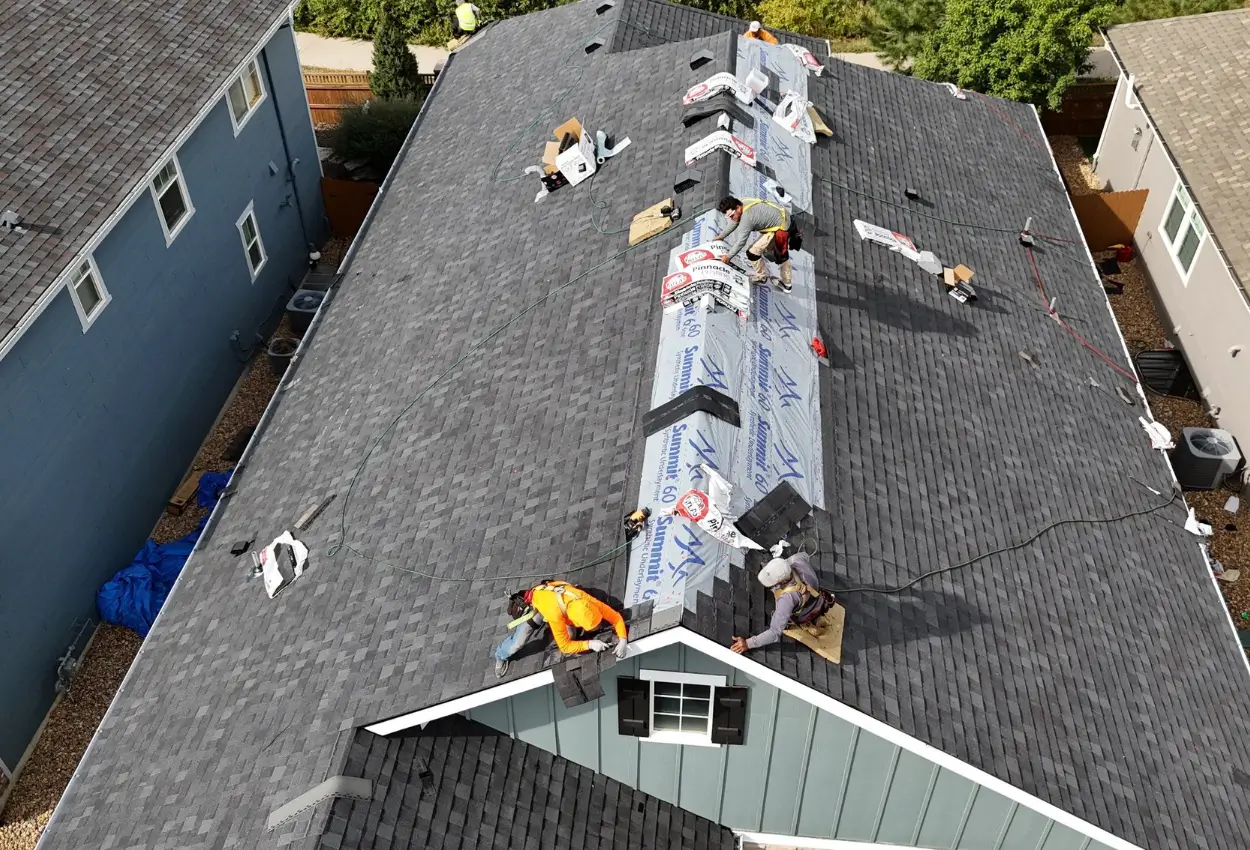 Brighton roofing company, Premier Restoration, installing a new roof.