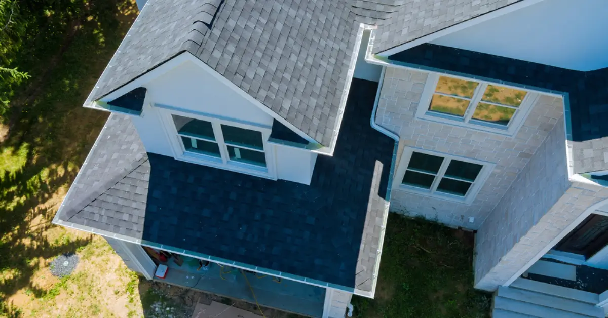 Asphalt shingle roof inspected by Premier Restoration and Construction for maintenance suggestions.
